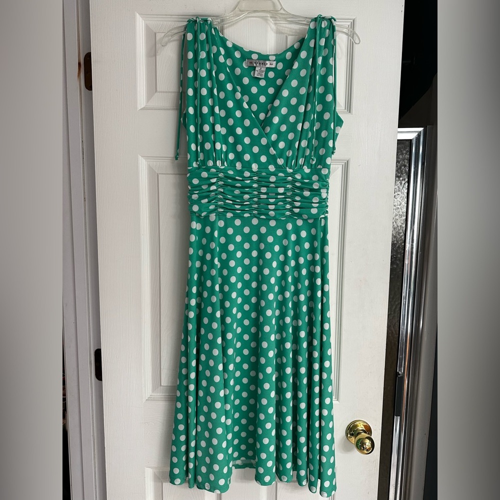 Green and white polka dot dress